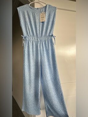 NEW ZARA Girls’ Light Blue Floral Jumpsuit – Size 9–10 (140 cm)